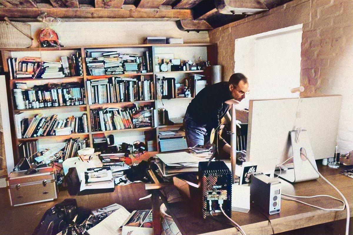 Steve Jobs in his cluttered home office in Palo Alto