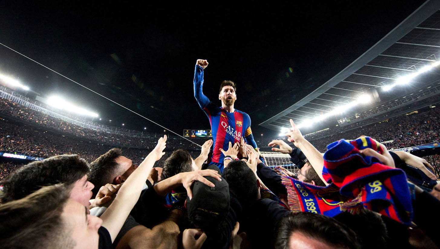 Lionel Messi celebrating on the shoulders of fans after the Remontada against PSG