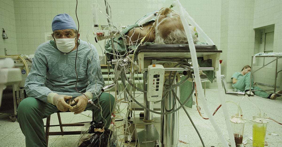 <strong>Dr. Zbigniew Religa</strong> after a 23-hour heart transplant surgery, 1987
